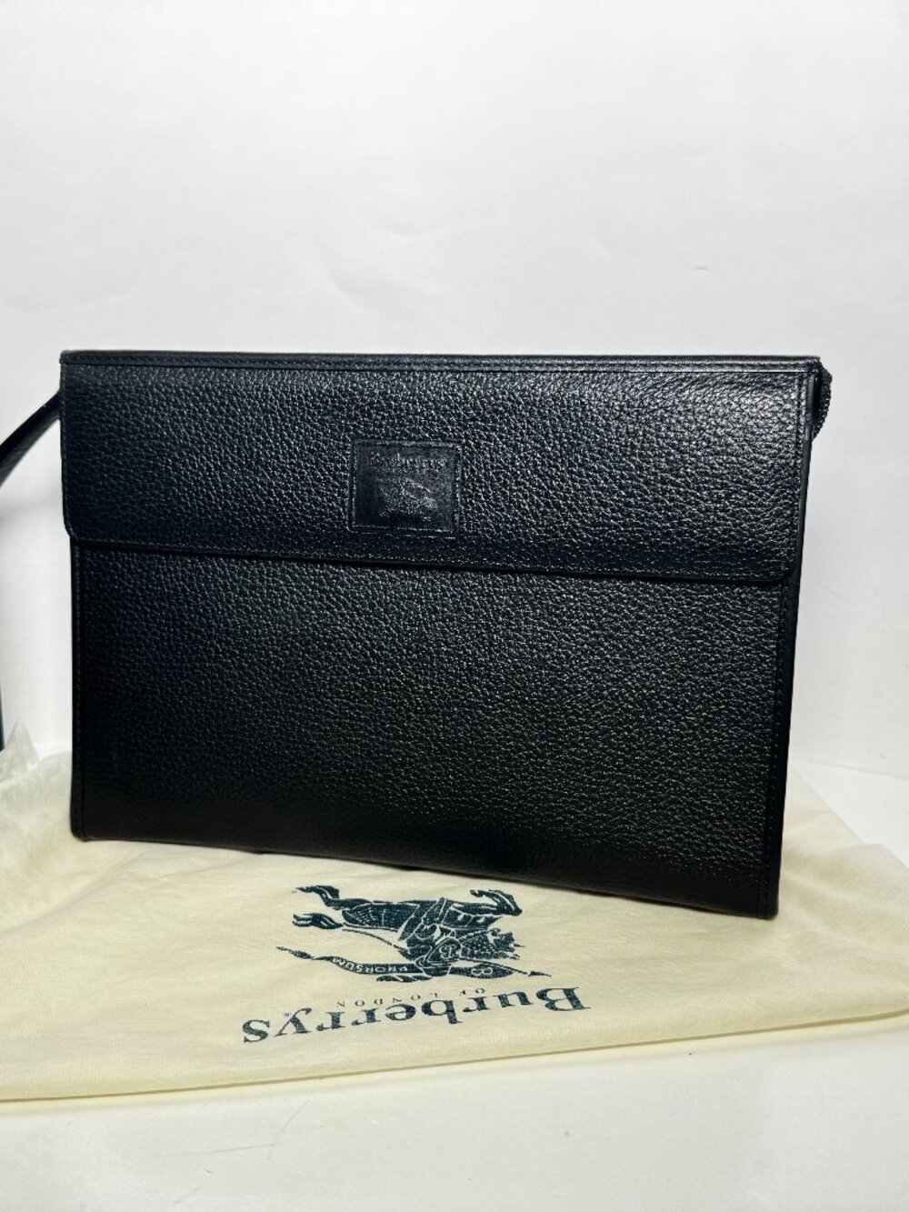 Authentic Burberrys Black Leather Clutch Hand Bag With Box and Dust Bag